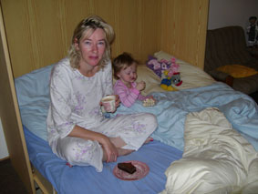 Breakfast in bed - popcorn and cake.